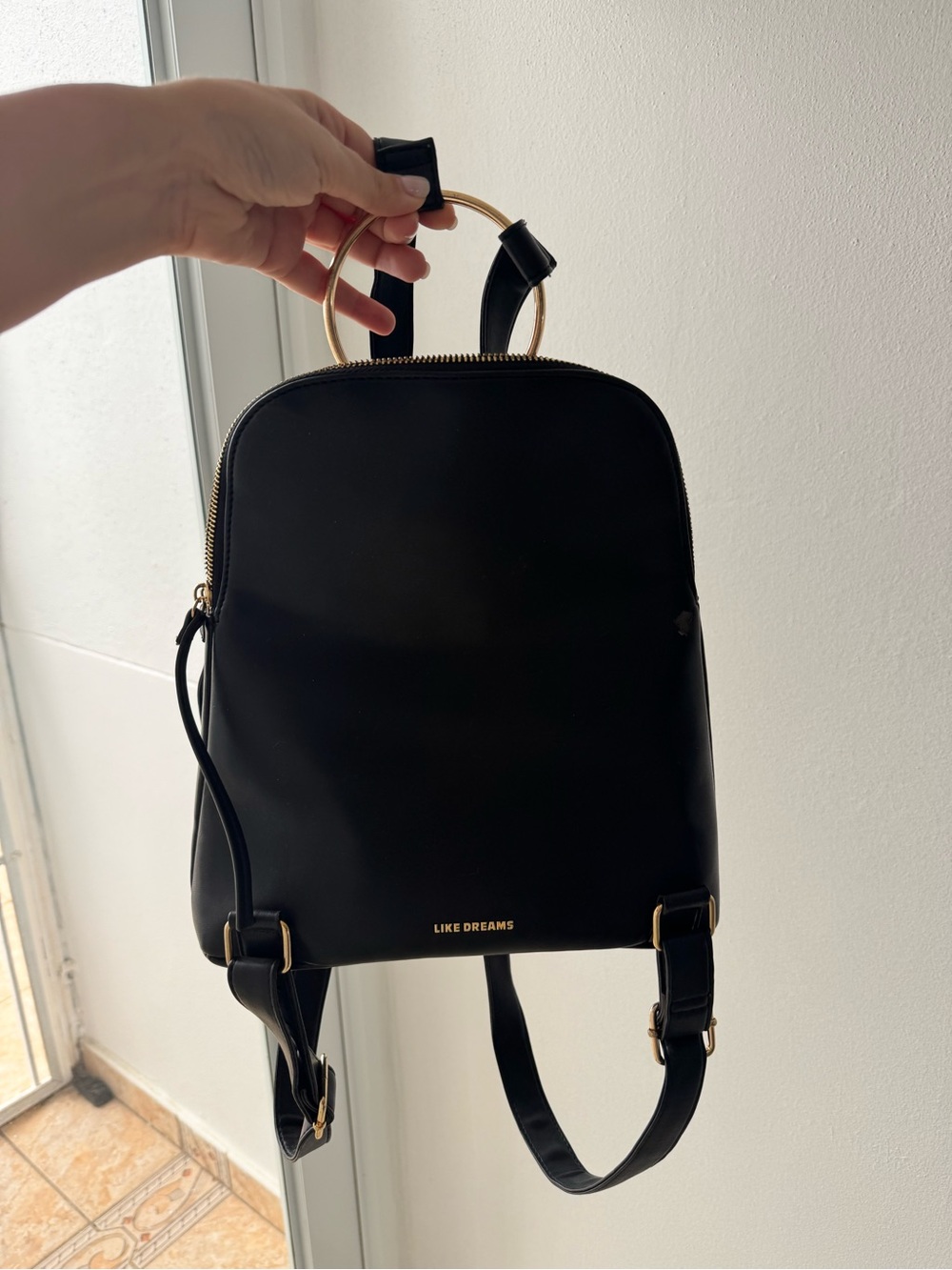 Black Backpack with Gold Ring Handles